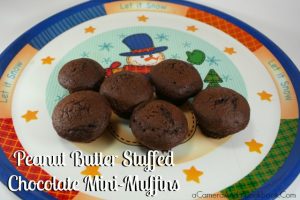 Peanut Butter Stuffed Chocolate Mini-Muffins are a great treat to bring to all those holiday parties.
