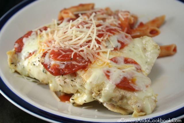 Pizza Smothered Chicken with a side of Pasta - a quick meal for those busy weeknights.